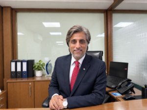 Muhammad Jawad Shami, Executive Vice President and Head Transaction Banking at HABIBMETRO, seated at his desk